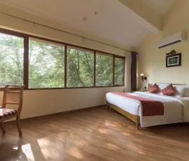Interior of traditional Kerala architecture premium cottage at Vythiri Village Resort Wayanad